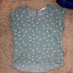 Green short sleeve shirt with light pink flowers